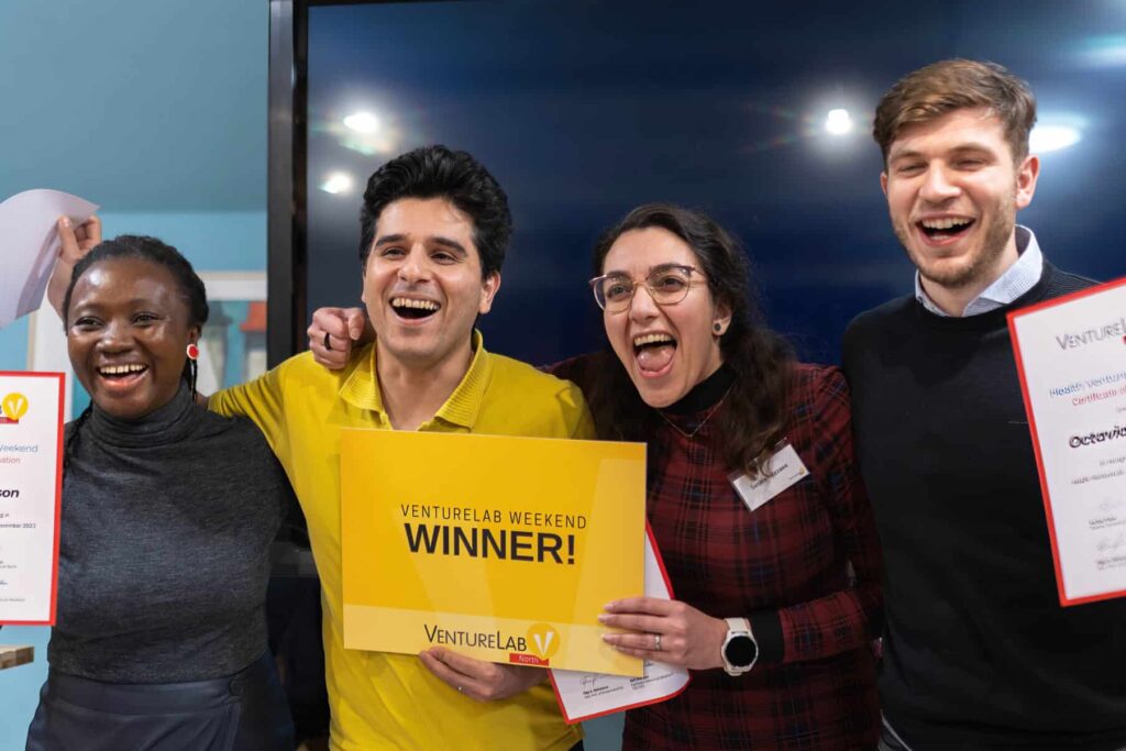 Winners of Health VentureLab Weekend 2023, ShineTech, celebrate after receiving their awards